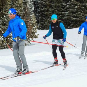 people cross country skiing in line